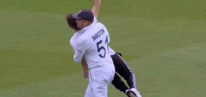 England's Wicketkeeper Jonny Bairstow Tackles Pitch Intruders. Jonny Bairstow seized one of the demonstrators and dragged him off the pitch.